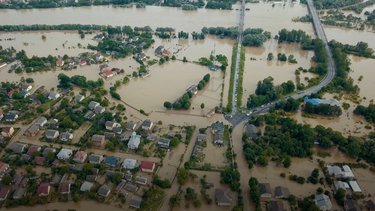 During heavy rains, city streets experience significant flooding