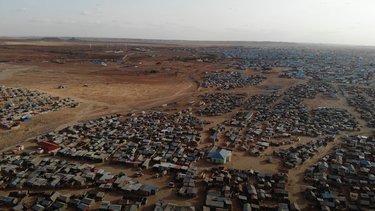 Drone footage of a camp for internally displaced persons (IDPs) on the edge of Garowe, Puntland, in Somalia